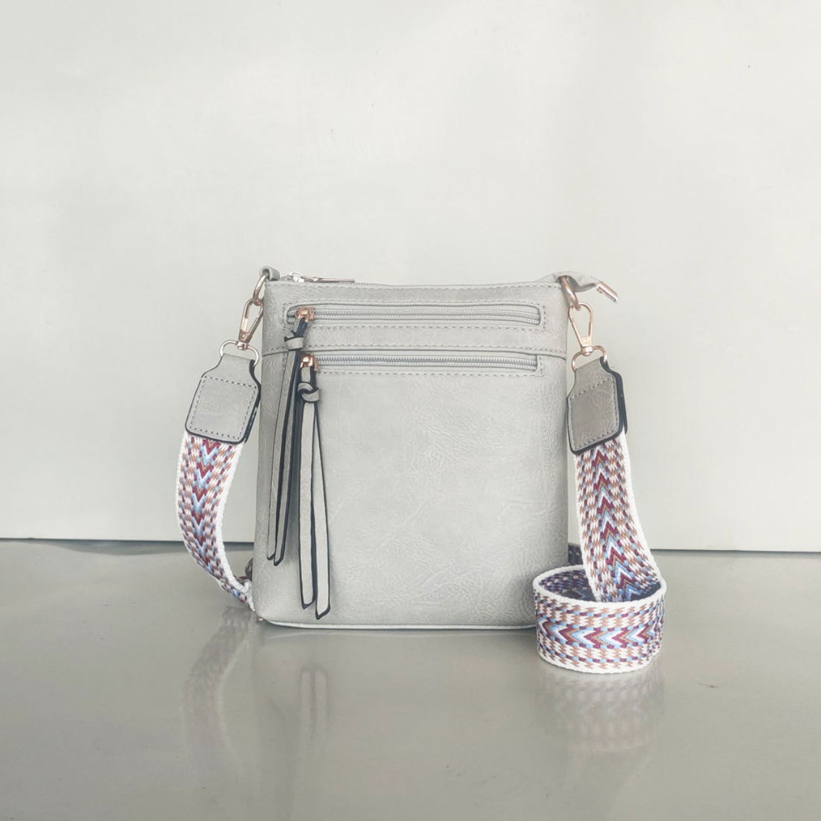 Multi-Zipper Vertical Shoulder Bag